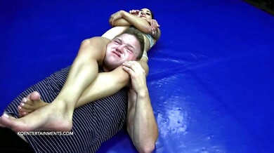 Nomi Melone's muscular thighs choke his face as she scissor-sits and dominates