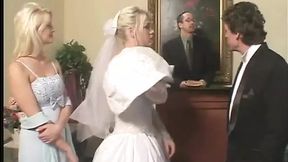 Blonde bride gets gangbanged in bed by two cocks