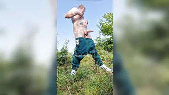 Ginger twink jerks his big uncut cock outdoors