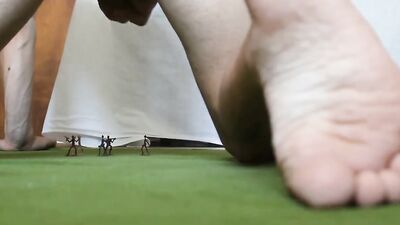 Naked dude is filming himself while playing with his tiny toys