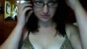 Busty geek shows of her sexy and appetizing titties on camera