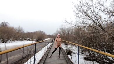 Naked Russian girl flashing tattoos on the bridge