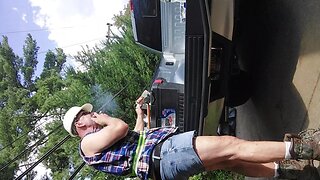 Construction bear taking a break, smoking a hot cigar outdoors