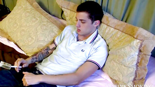 Tattooed Chris Porter solo smoking and cock stroking