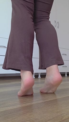 Shiny soles get you excited? Watch as she teases with her glistening feet.