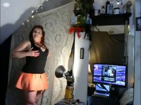 Sensual Redhead Strips and Teases in an Intimate Solo Experience