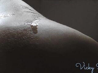 Putting oil on my legs, abdomen, booty and boobs beneath sunny window - Vicky Swan