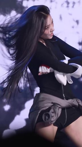 Slim brunette dancer shows off her thick thighs in a sultry solo