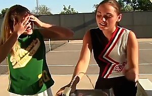 Two teens start lesbian masturbation on the tennis court