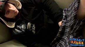 Young thug stroking his cock hard while watching porn