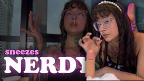 A nerdy girl with glasses sneezes on your dick