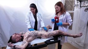 Inanna Justice and Thalia Hel Begin a Sadistic Sounding Procedure on Their Restrained Patient