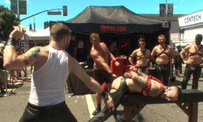 Public Pride Parade humiliation for a BDSM super-sub