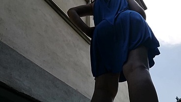 Upskirt pee in a outdoor public place