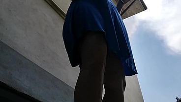 Upskirt pee in a outdoor public place