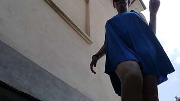 Upskirt pee in a outdoor public place