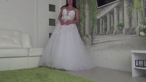 LORY bride s feet are very sore in her wedding shoes a
