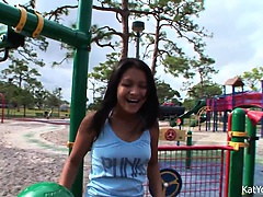 Kat Young teases her webcam viewers while she climbs at the playground