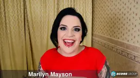 Busty Marilyn Mayson shows off in a tight dress