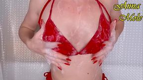 In the bathroom, I play with nipples and soapy breasts