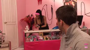 Dark-haired sex shop worker demonstrates products with her big ass and pussy eating skills