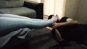 Raw sole devotion for a denim-clad siren's tootsies