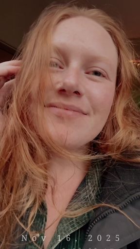Red-haired woman in public