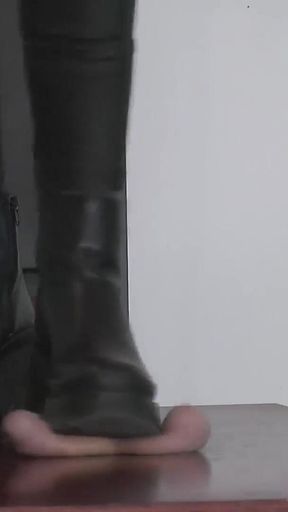 The Orgasm of a Slave Under Mistress Cassy's Boots