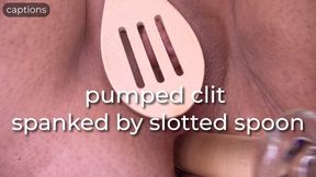 pumped clit spanked by slotted spoon - captioned