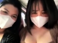 two sisters being sensual on the bus for the camera 84412587