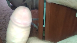 Jerking off in front of the mirror, fantasizing.