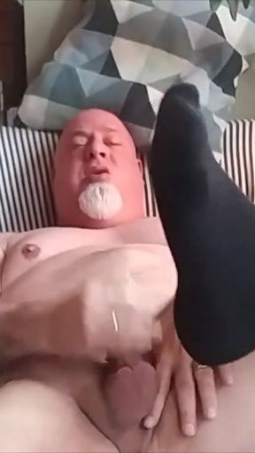 Key moment from "OTC SOCKS!! Bear jerks in Black OTC Socks"