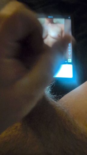 Hand holding cell phone