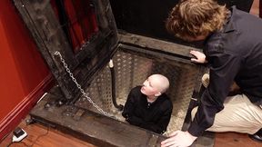 straightjacketed in a very secure underground box! i was very keen as usual, and a bit giggly, and sinister had some fun manh...