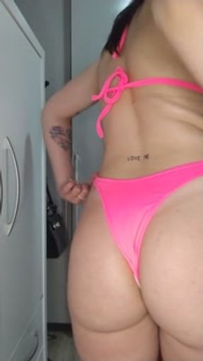 latina trying on new bikini