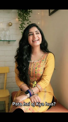 Indian woman in a yellow dress