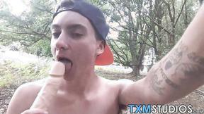 ”Young FTM shaft rider shoves a dildo in his hole outdoors”