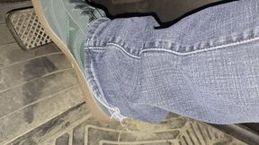 Green sneakers on the pedals!