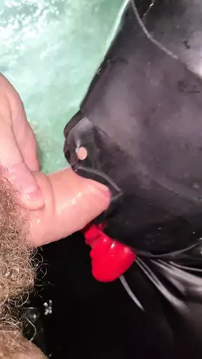 She gives me a blowjob until she's tied up with the catsuit