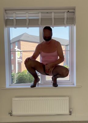 Slut fag sissy wanking in the window