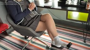 Amelie shoeplays wearing her old school uniform