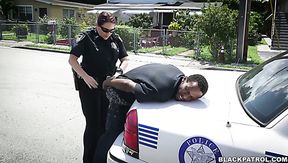 Horny officers of the law fuck black scofflaw in threesome