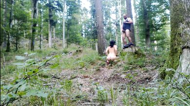 Brunette MILF stripped bare and pissed on in German garden