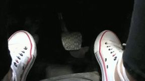 White sneakers on the road