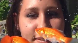 Hungry woman can't resist and devours all her fish - vore giantess