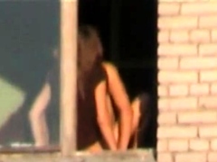 follando en la ventana