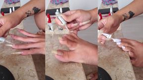 Polishing my enormous fingernails transparent and my long toenails white!