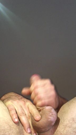 Lazy Handjob of a Small Uncut White Cock.