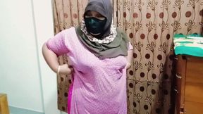 Hijabi girl takes off her clothes and wears a saree. Those big breasts are visible.