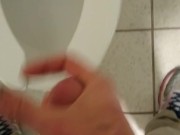 Dude jerks off quietly in stall next to you.